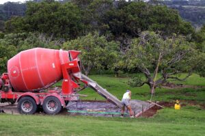 Houston concrete supplier pouring concrete on prepped soil