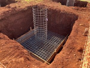 concrete sitework with reinforcement for foundation footing ready for Houston concrete supplier to pour the concrete